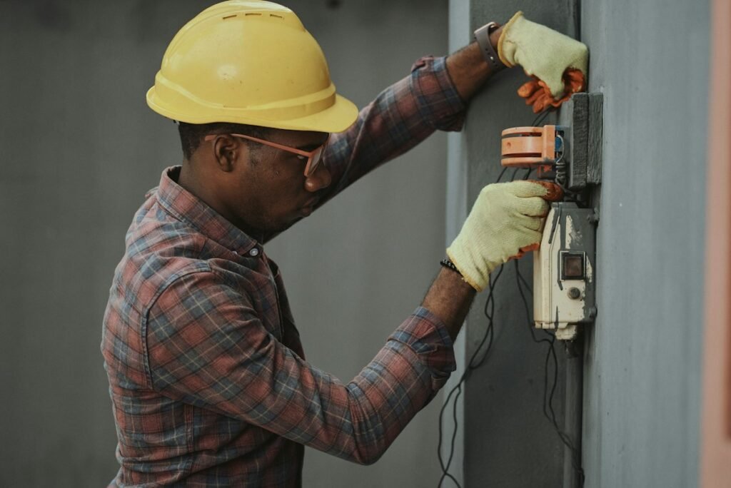 Technician holding tools before an AC maintenance visit